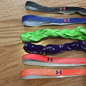 Six Under Armour headbands